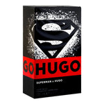 Superman x Hugo perfume packaging with black and red design