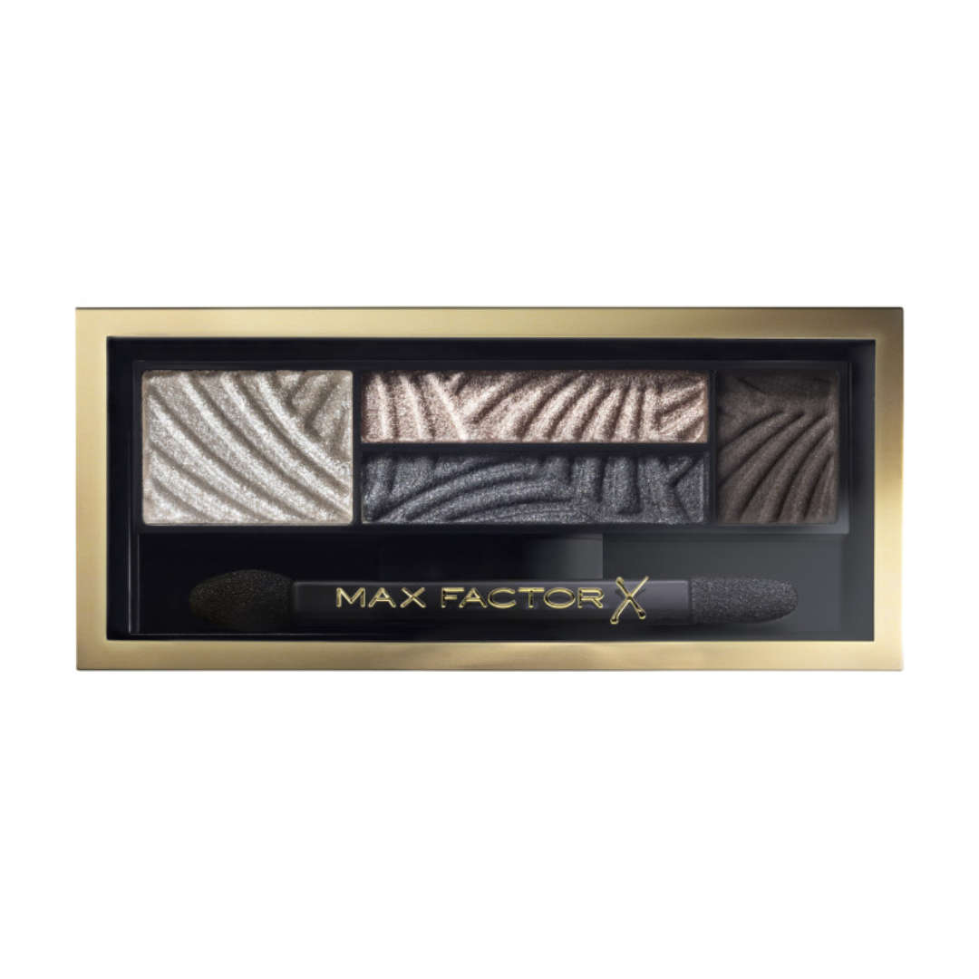 Max Factor eyeshadow palette with gold and black packaging on a white background