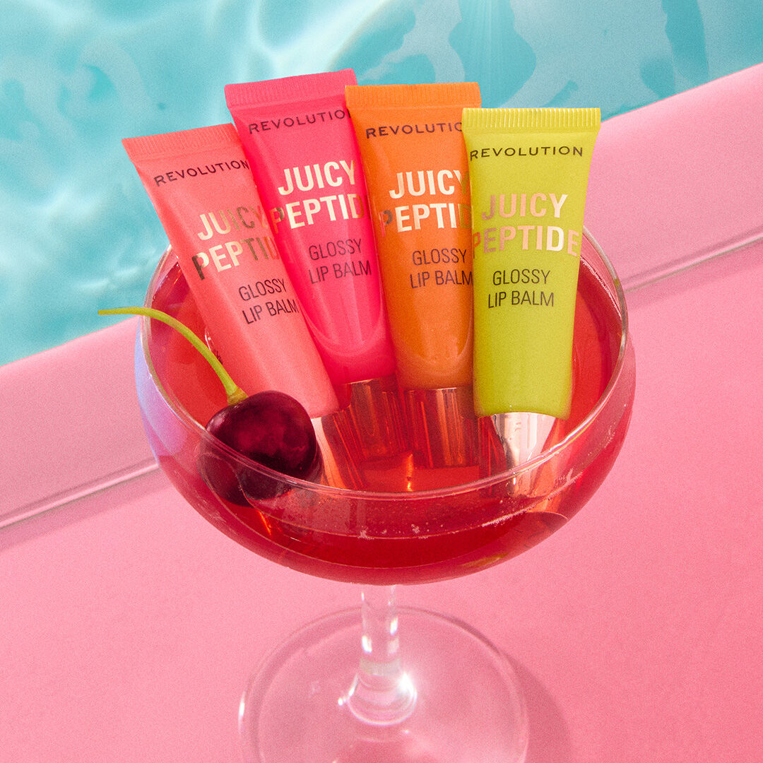 Revolution Juicy Peptide Lip Balm Guava Rum Punch Coral 8ml